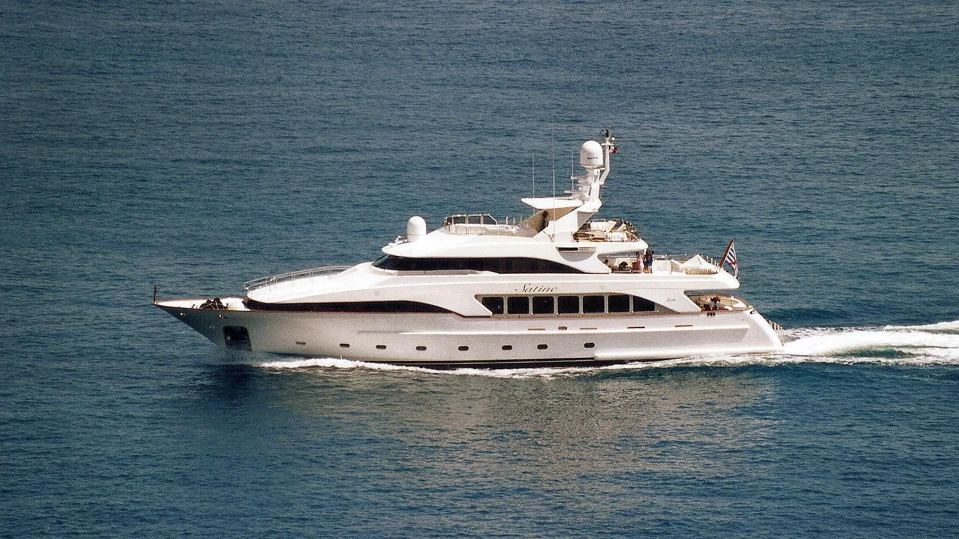 a white yacht on the water aboard SATINE Yacht for Sale