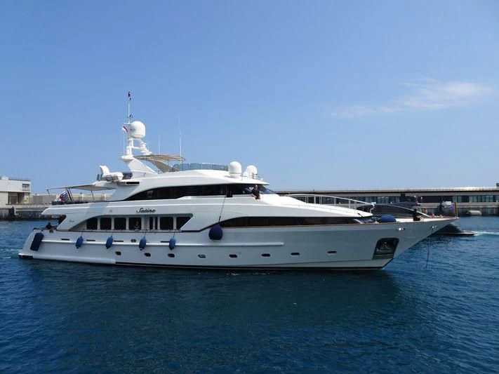 a white yacht in the water aboard SATINE Yacht for Sale