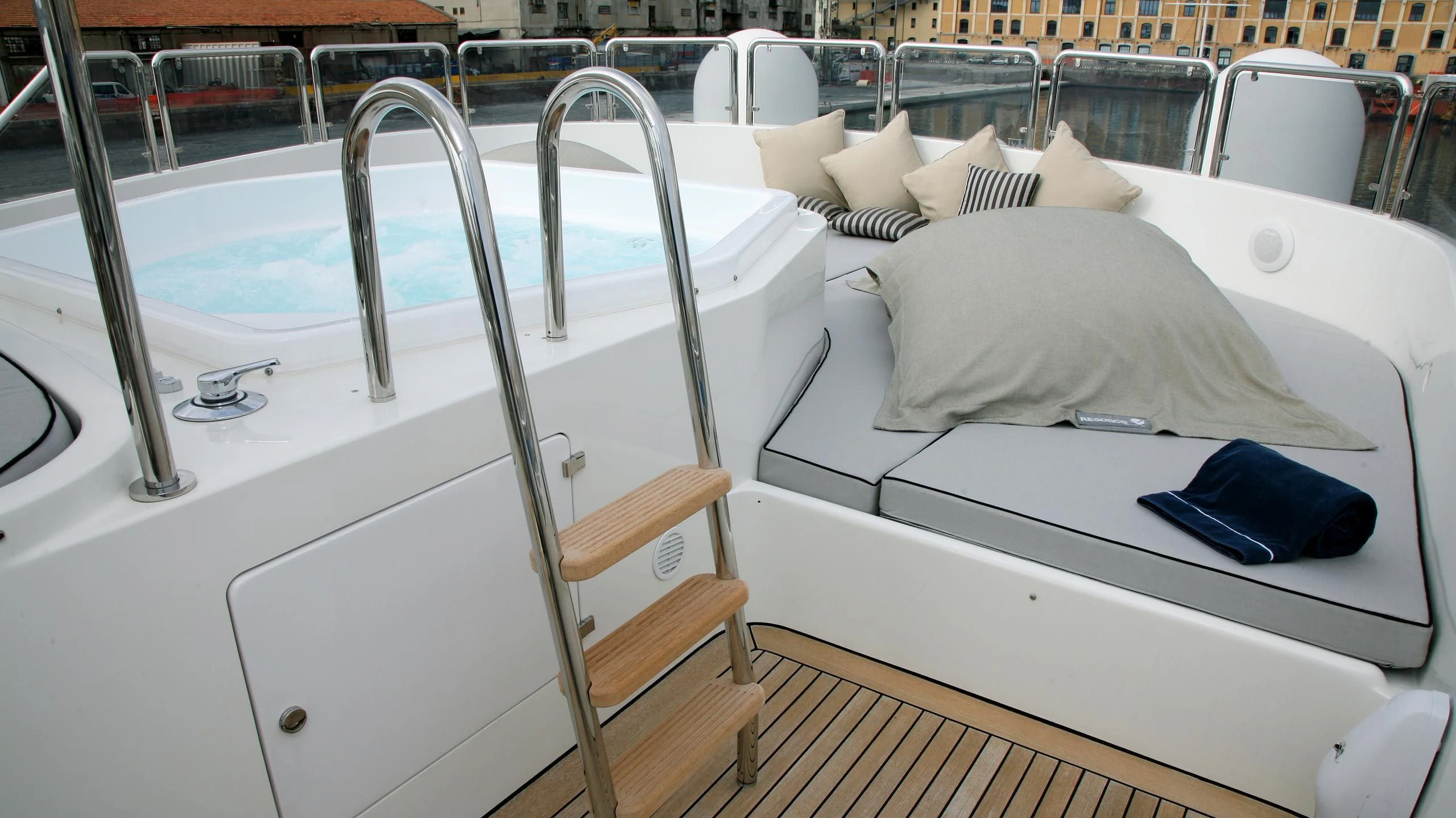 a boat with a blue towel on the front aboard SATINE Yacht for Sale