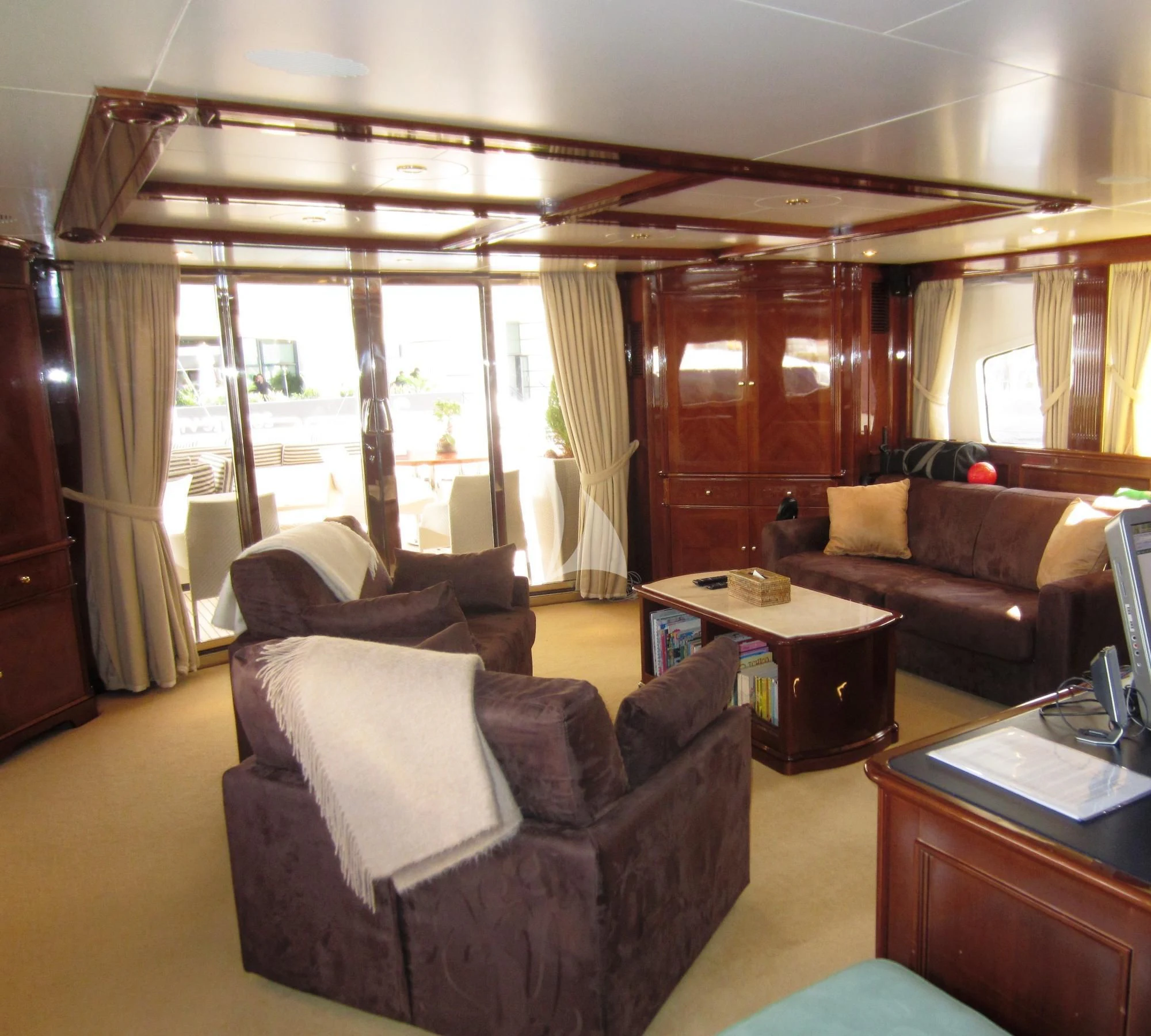 a living room with a large window aboard SATINE Yacht for Sale