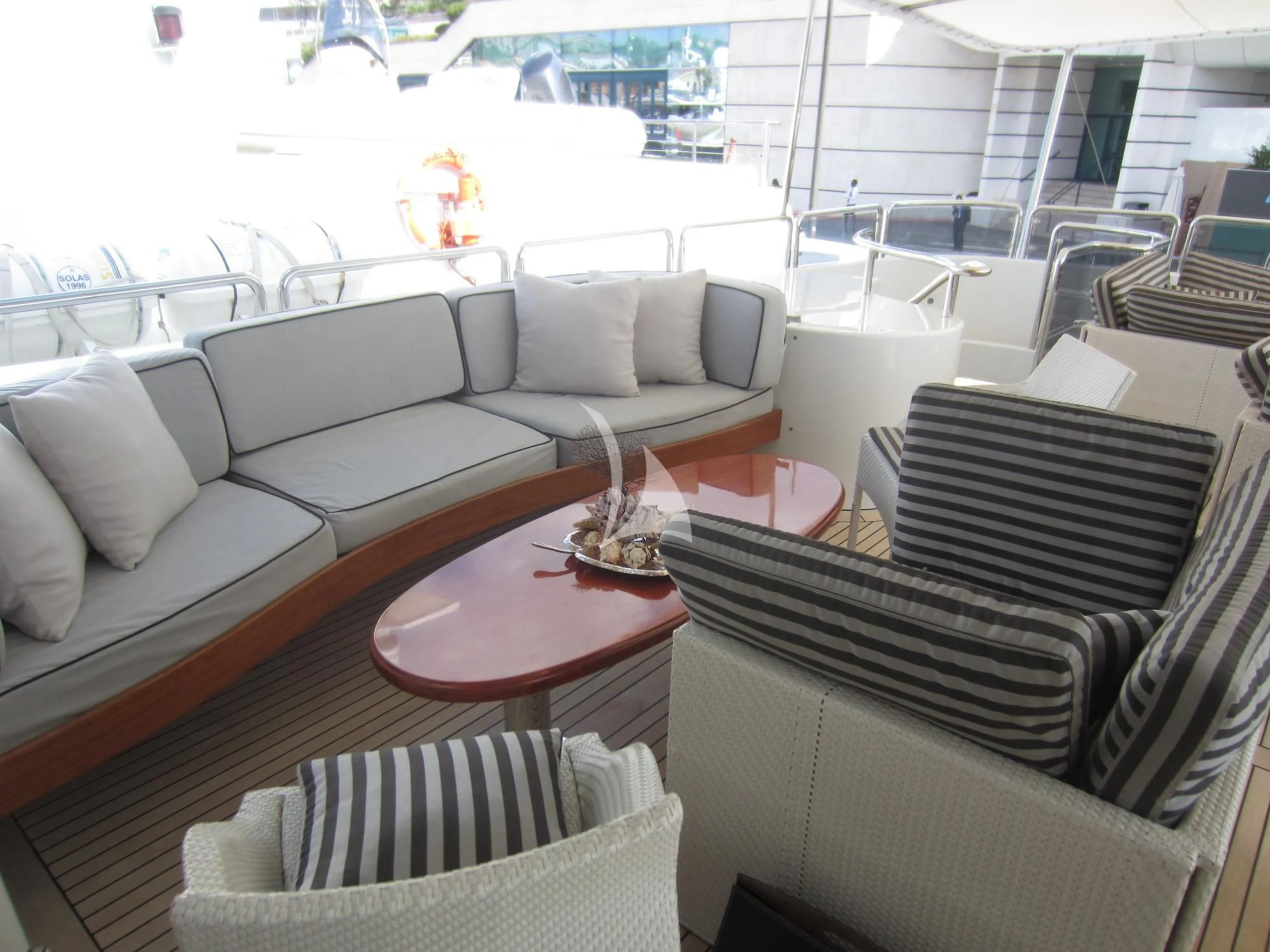 a living room with a large window aboard SATINE Yacht for Sale