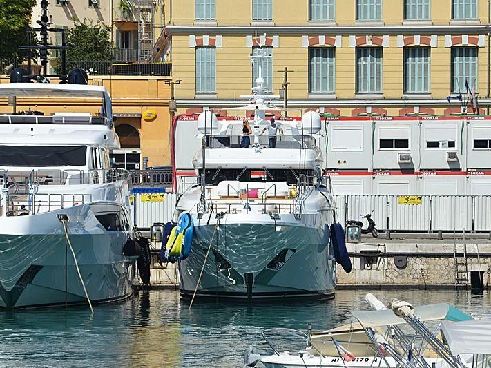 boats docked in a harbor aboard NAZ Yacht for Sale