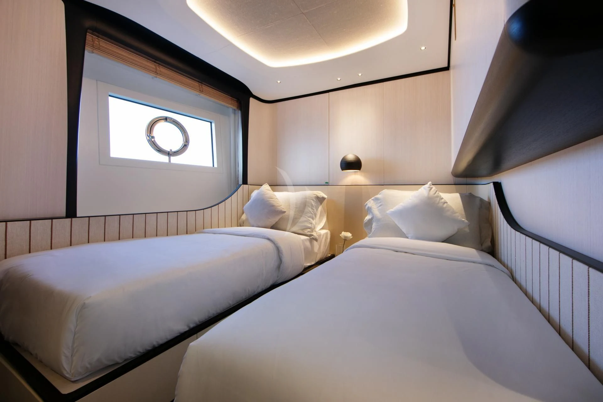 a couple of beds in a room aboard NAZ Yacht for Sale