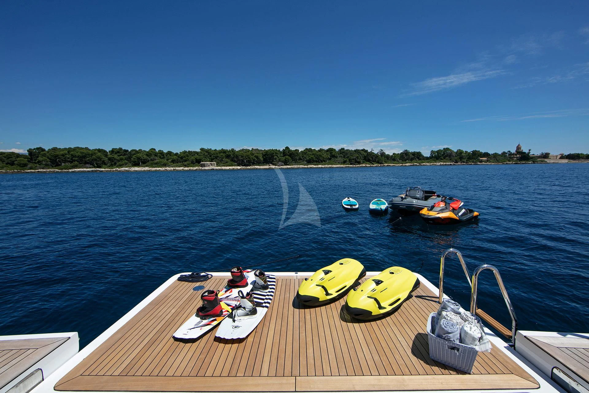 a group of people in boats on a dock by a body of water aboard NAZ Yacht for Sale