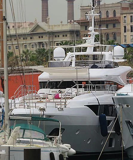 a group of boats are parked in a harbor aboard NAZ Yacht for Sale