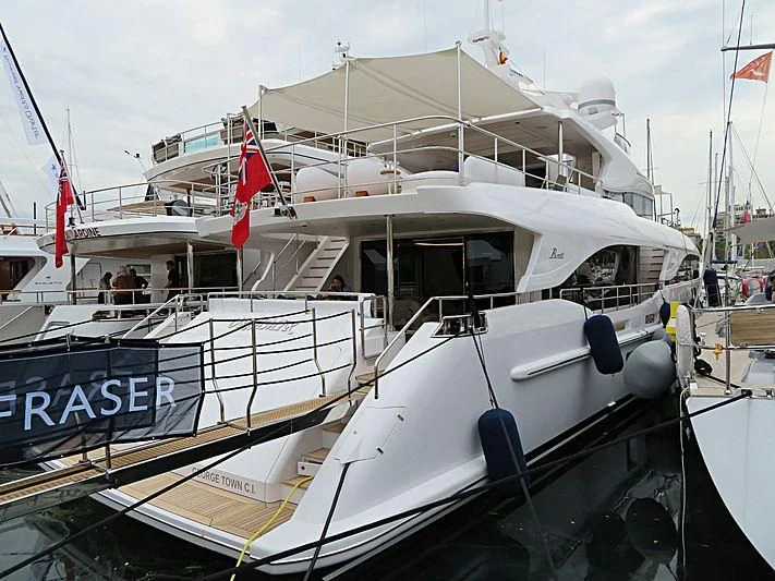 a boat docked at a pier aboard NAZ Yacht for Sale