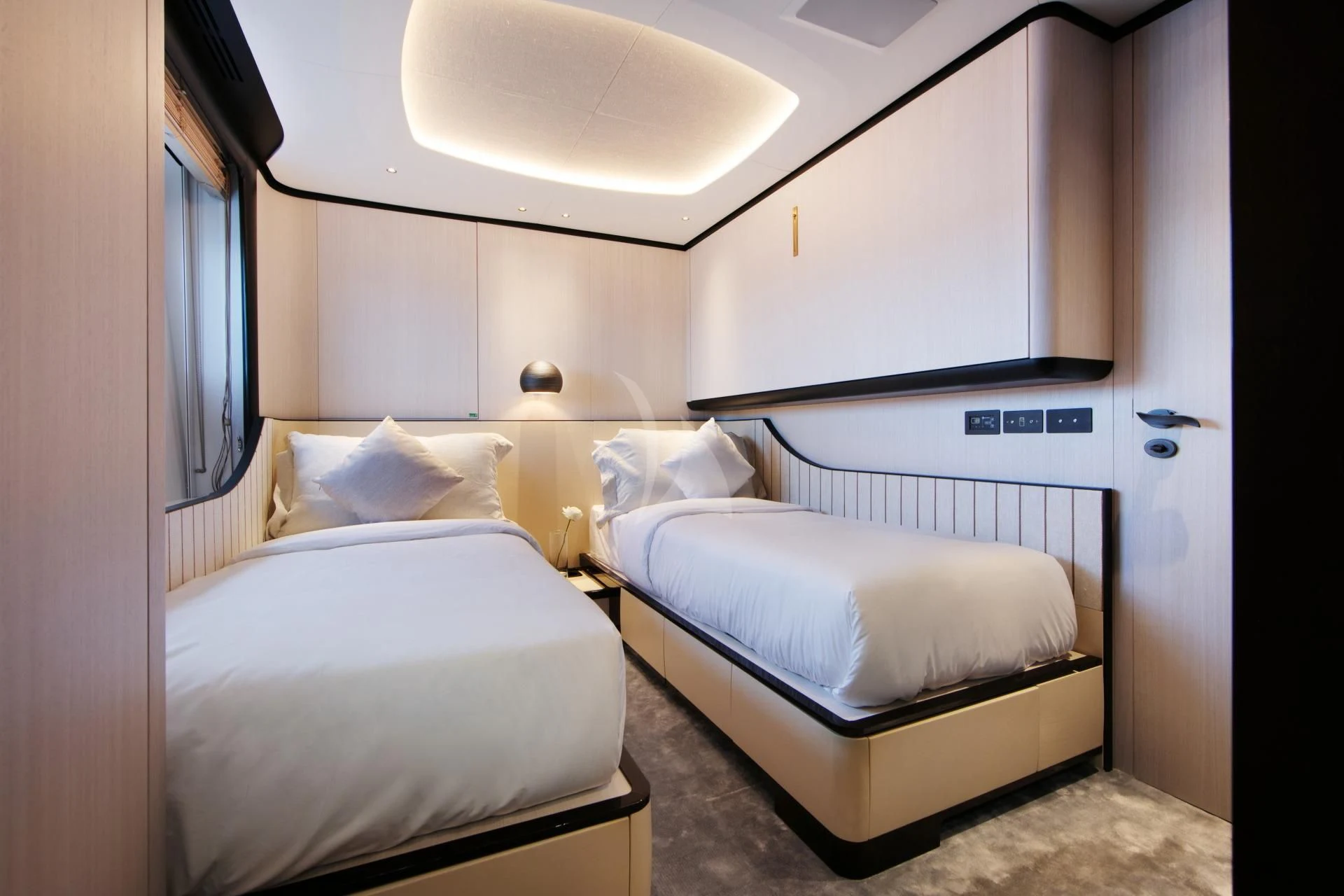 a couple of beds in a room aboard NAZ Yacht for Sale