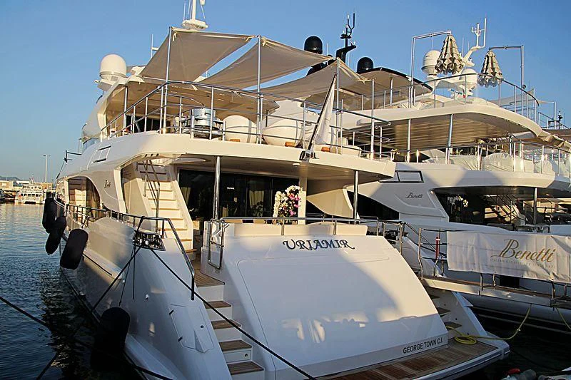 a boat docked at a pier aboard NAZ Yacht for Sale