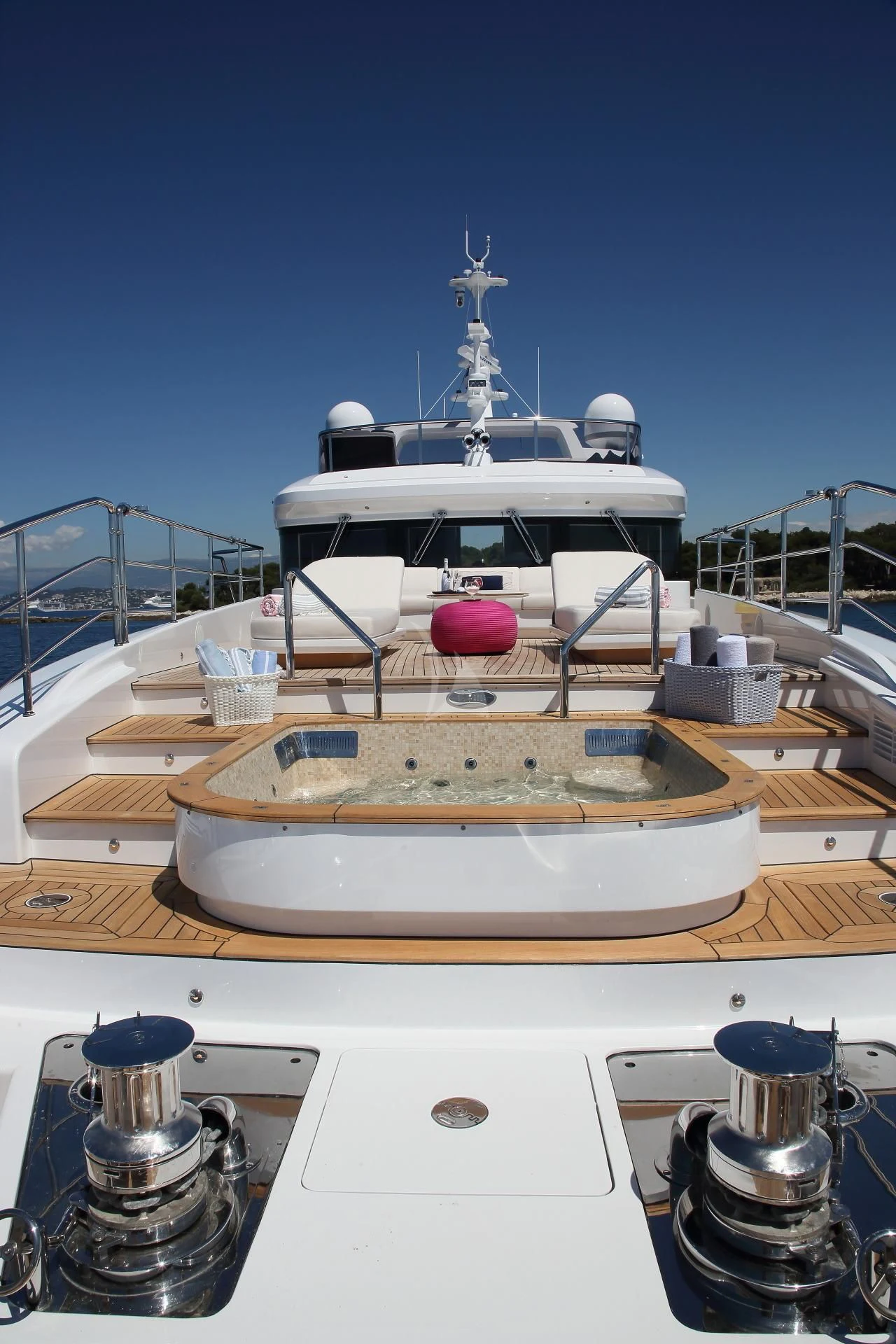 a large white boat on a dock aboard NAZ Yacht for Sale