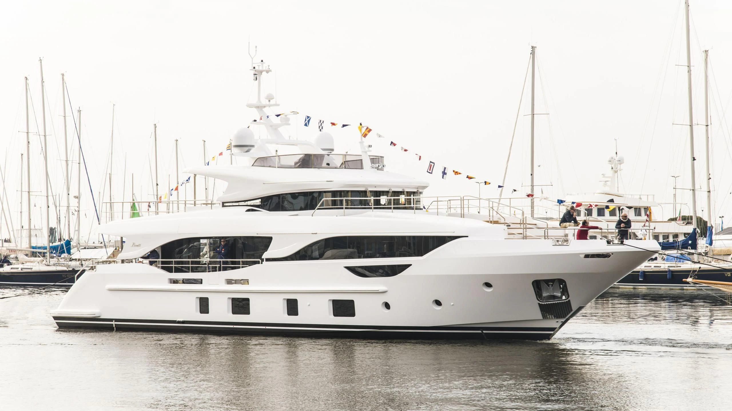 a white yacht on the water aboard NAZ Yacht for Sale