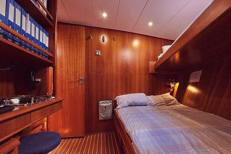 a bed in a room aboard ANAMCARA Yacht for Sale