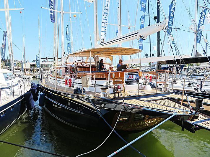 a large boat docked at a pier aboard ANAMCARA Yacht for Sale