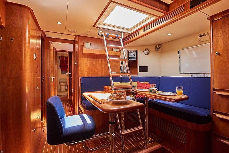 a small kitchen with a ladder aboard ANAMCARA Yacht for Sale