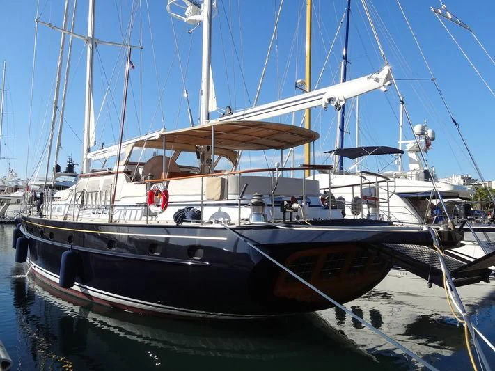 a boat docked at a pier aboard ANAMCARA Yacht for Sale