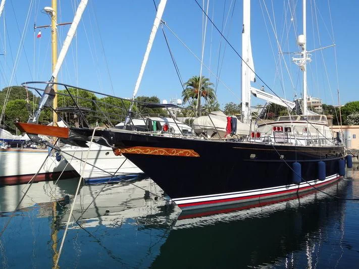 a boat docked at a pier aboard ANAMCARA Yacht for Sale