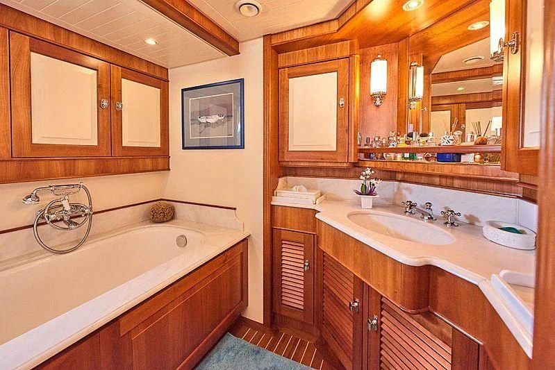 a bathroom with a large bathtub aboard ANAMCARA Yacht for Sale