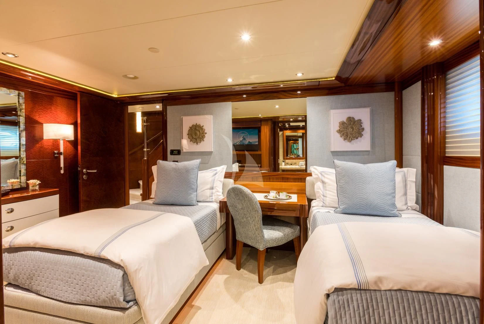 a hotel room with two beds aboard CHASING DAYLIGHT Yacht for Sale