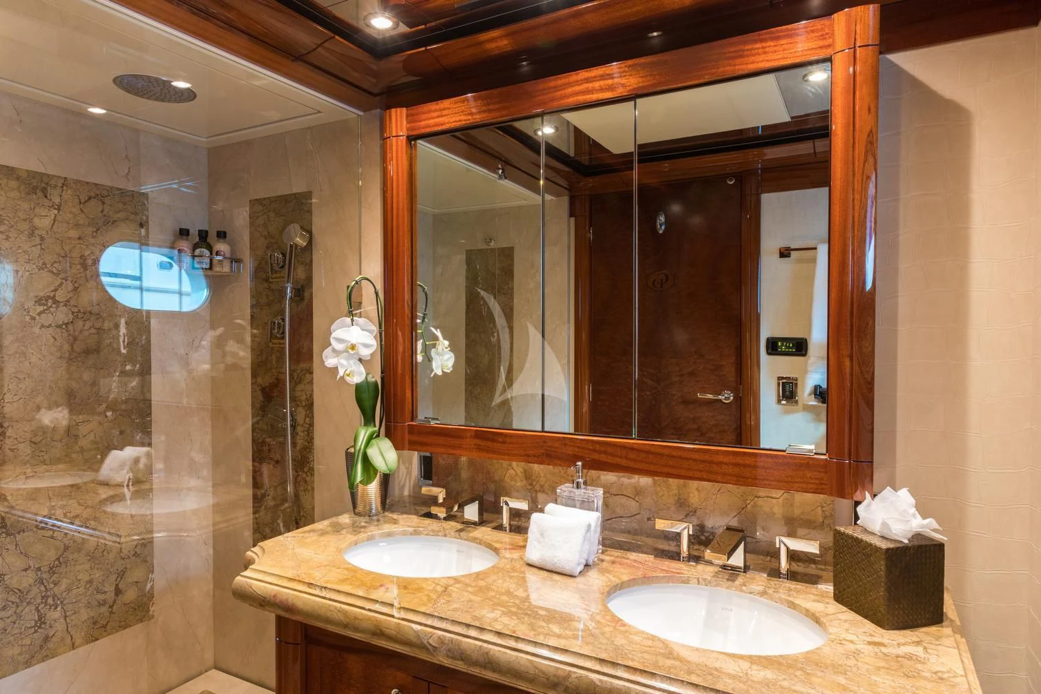 a bathroom with two sinks aboard CHASING DAYLIGHT Yacht for Sale
