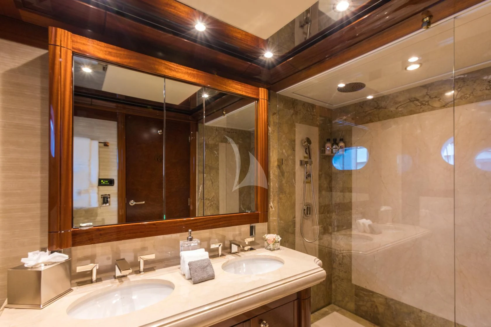 a bathroom with two sinks aboard CHASING DAYLIGHT Yacht for Sale
