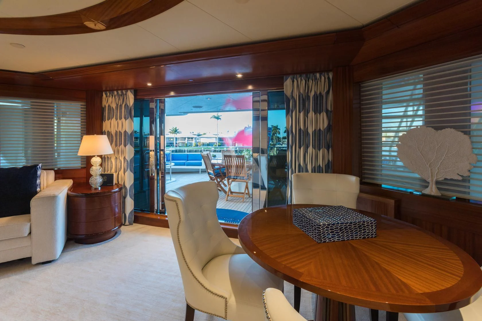 a living room with a large window aboard CHASING DAYLIGHT Yacht for Sale