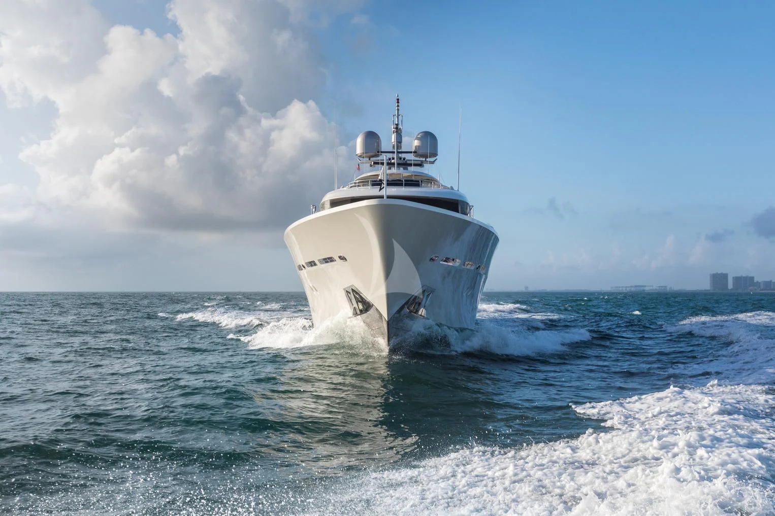 a white boat in the water aboard CHASING DAYLIGHT Yacht for Sale