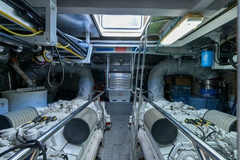 a large room with machinery aboard INDECENT PROPOSAL 4 Yacht for Sale