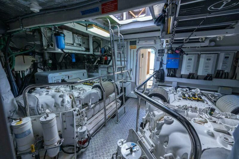 a room with machinery aboard INDECENT PROPOSAL 4 Yacht for Sale