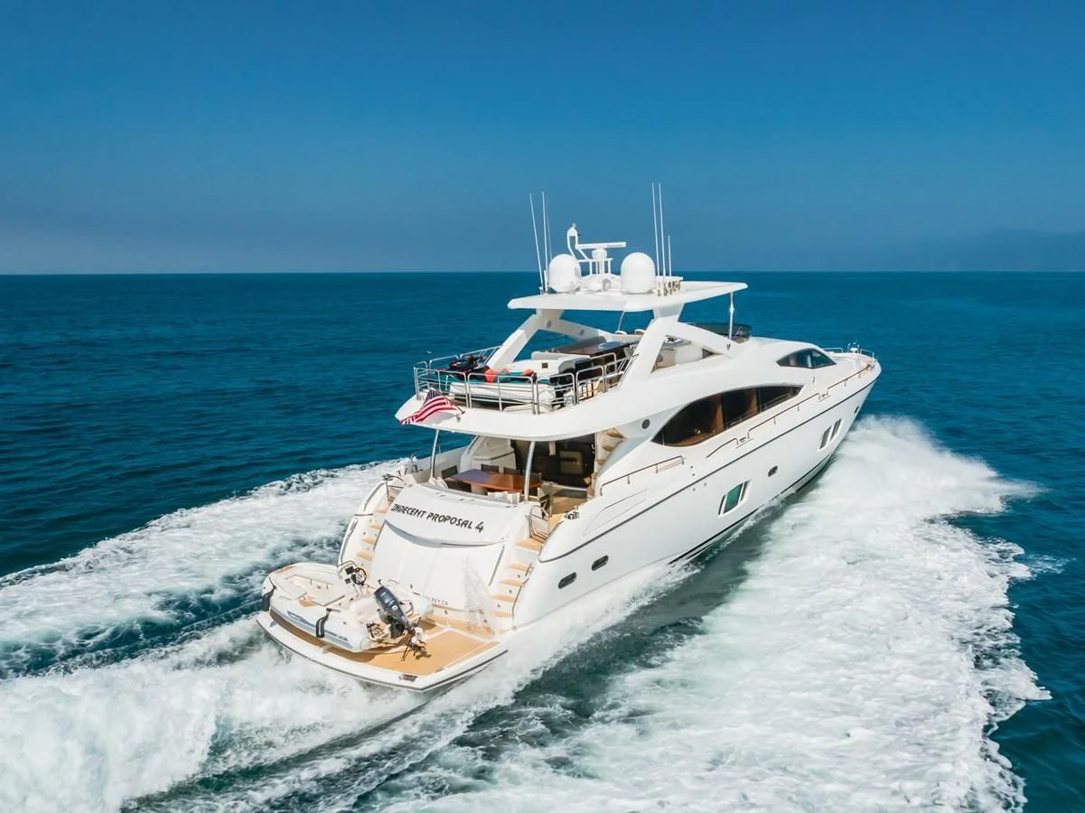 a boat on the water aboard INDECENT PROPOSAL 4 Yacht for Sale