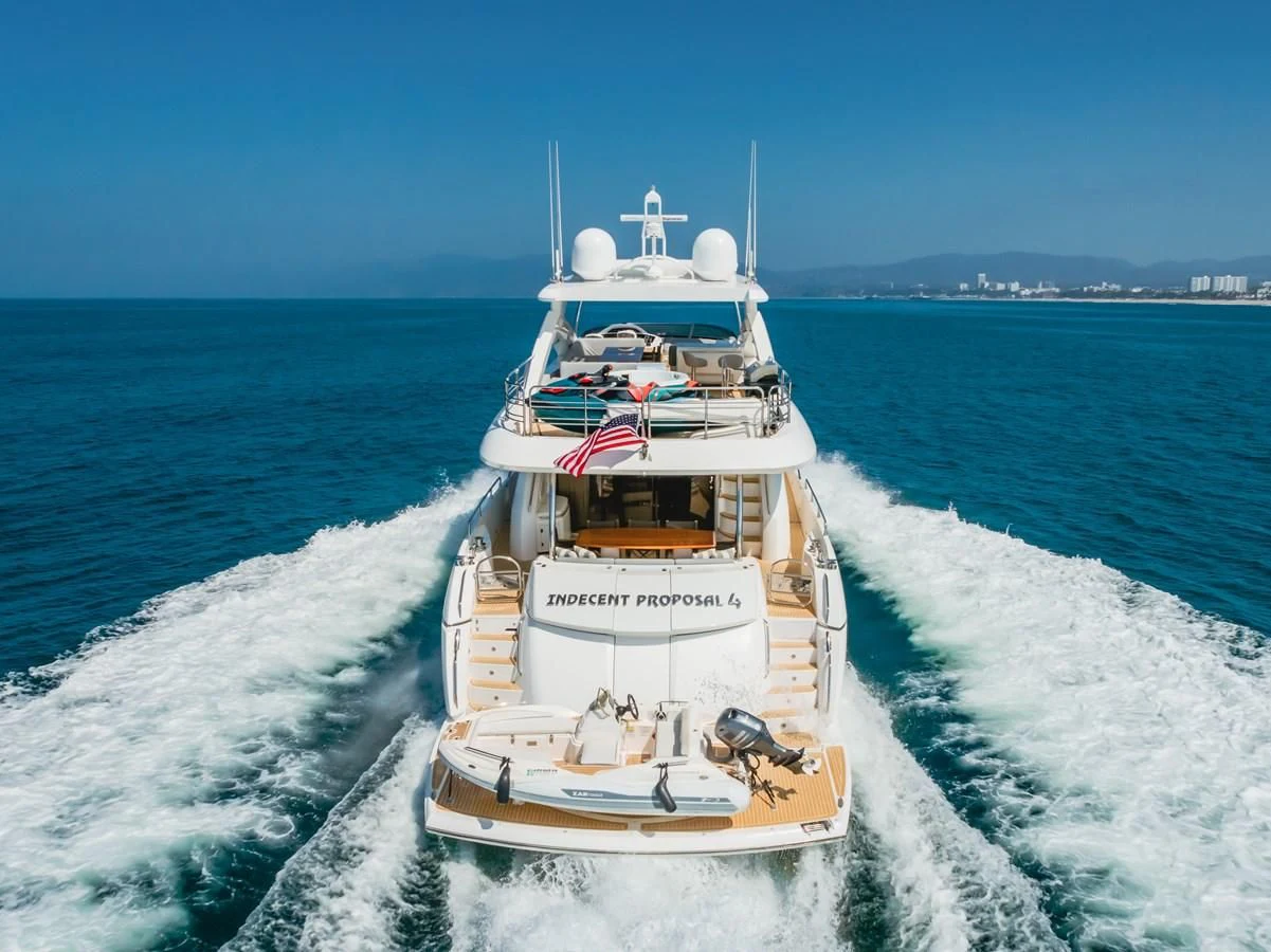 a boat on the water aboard INDECENT PROPOSAL 4 Yacht for Sale
