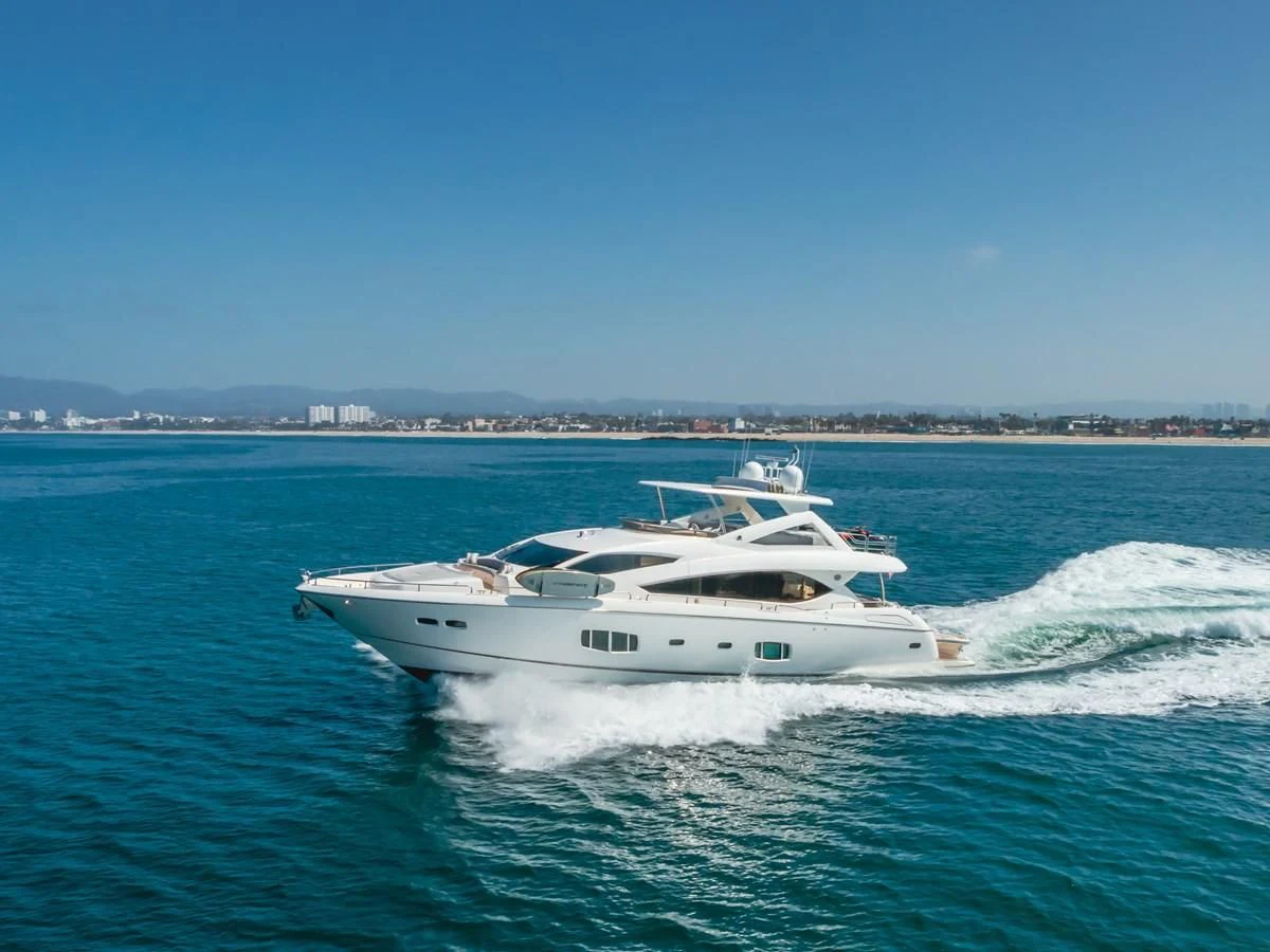 a white boat on the water aboard INDECENT PROPOSAL 4 Yacht for Sale