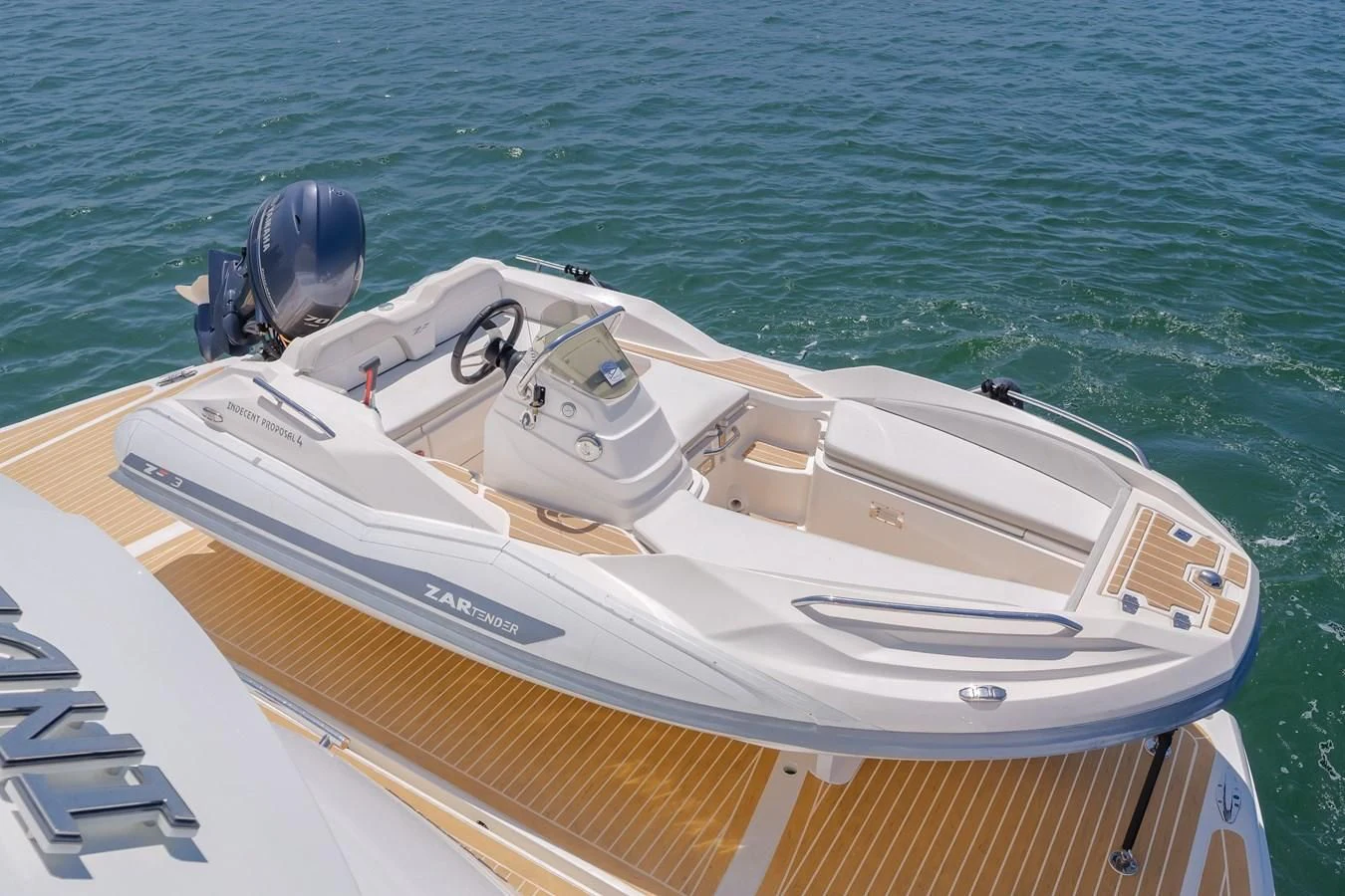 a boat on the water aboard INDECENT PROPOSAL 4 Yacht for Sale
