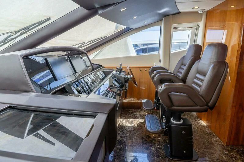 inside of a car aboard INDECENT PROPOSAL 4 Yacht for Sale