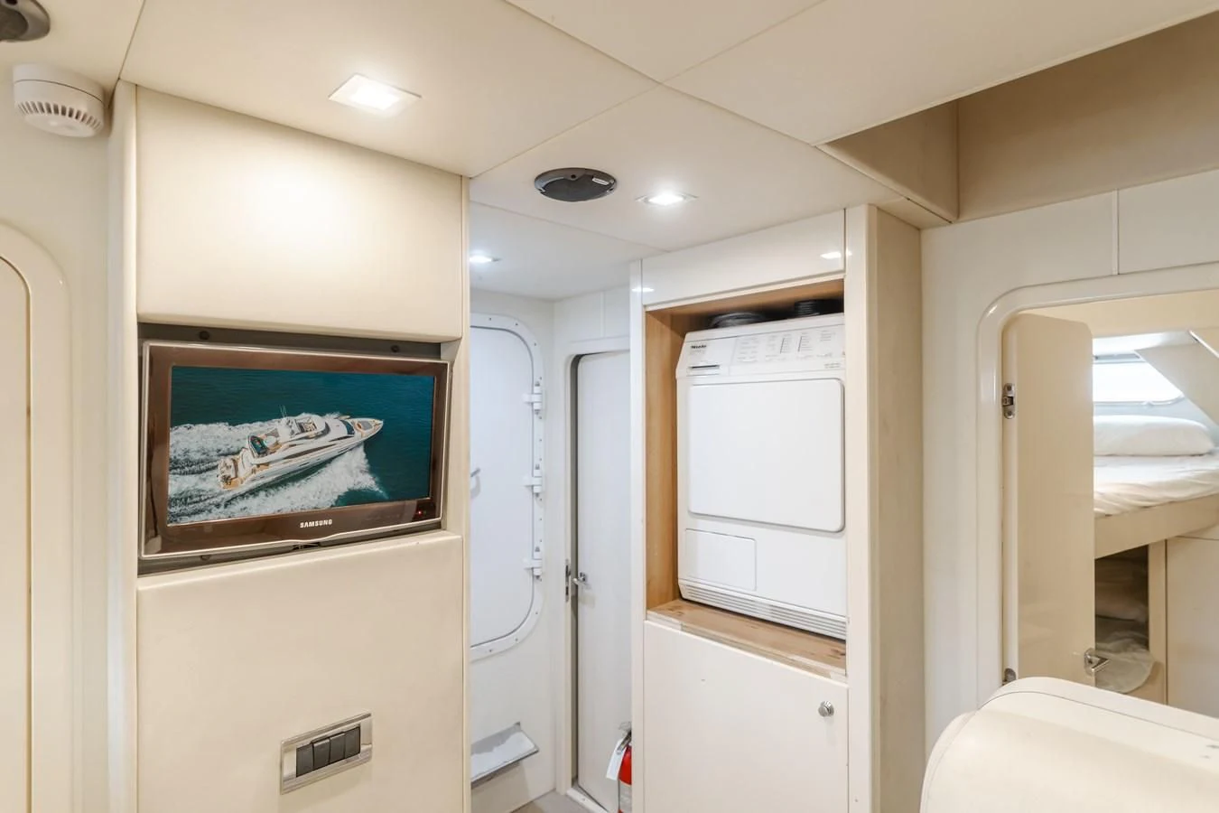 a tv on a wall aboard INDECENT PROPOSAL 4 Yacht for Sale