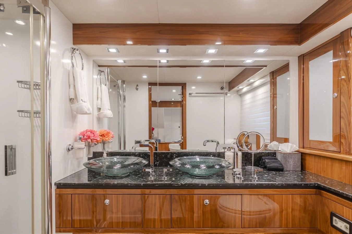 a kitchen with a marble counter top aboard INDECENT PROPOSAL 4 Yacht for Sale
