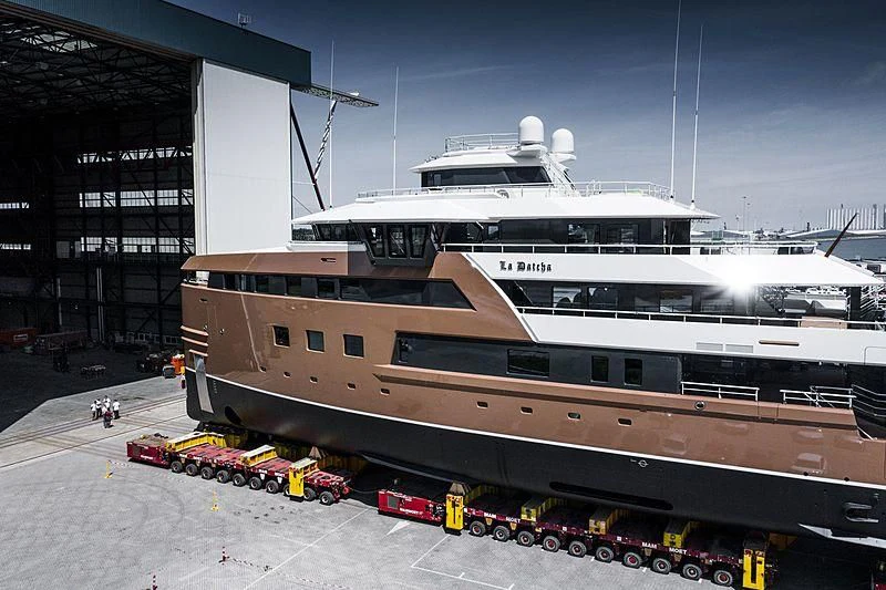 a large cruise ship docked aboard LA DATCHA Yacht for Sale