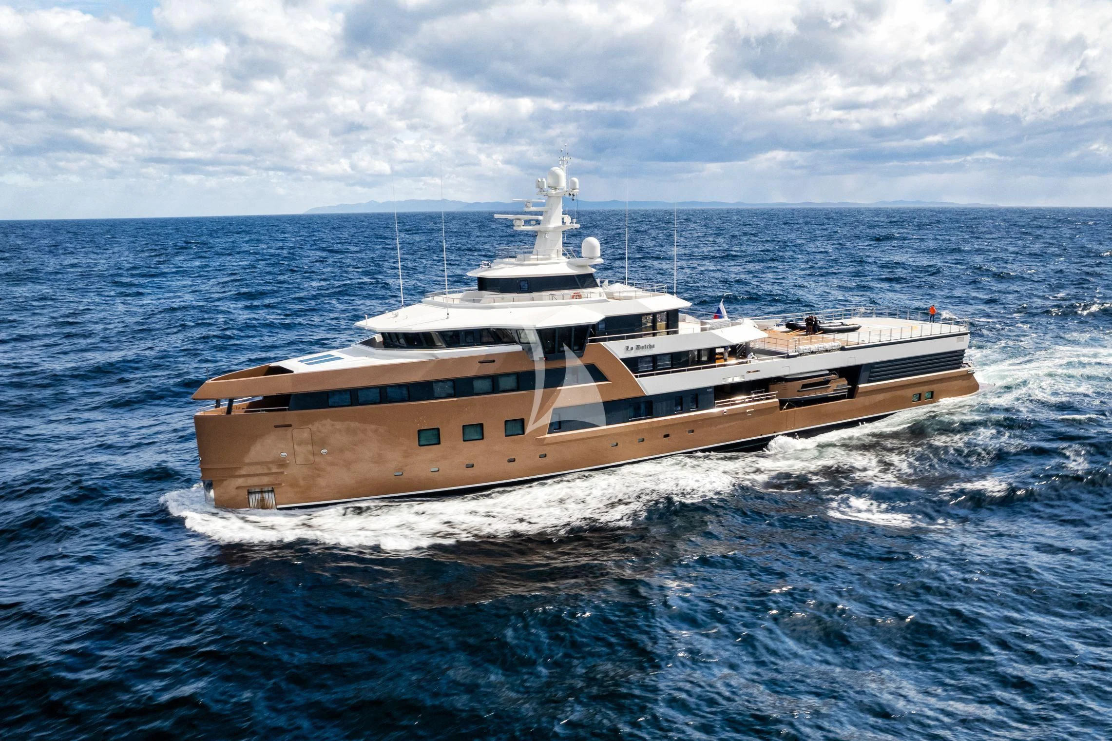 a large ship in the water aboard LA DATCHA Yacht for Sale