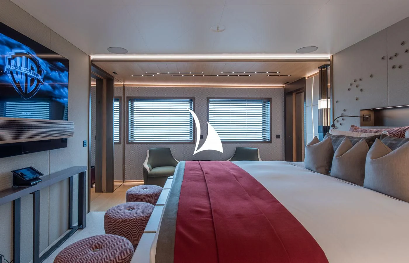 a bed with pink sheets aboard LA DATCHA Yacht for Sale