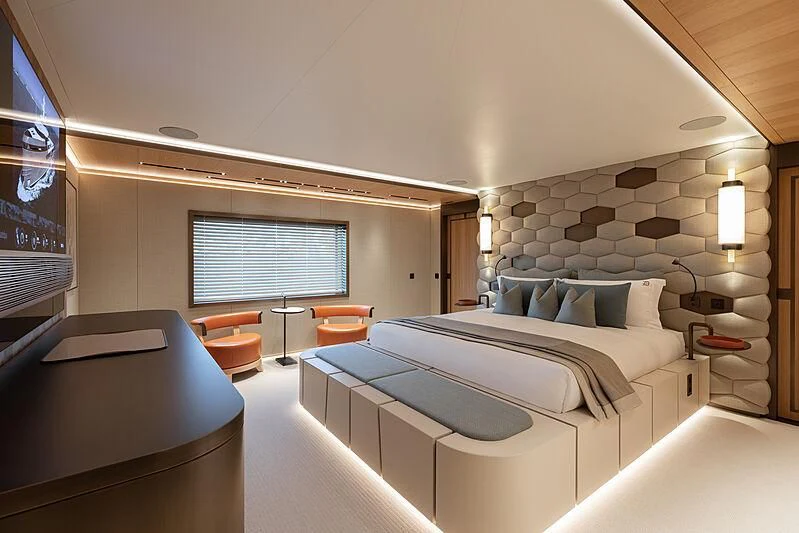 a room with a bed and a couch aboard LA DATCHA Yacht for Sale