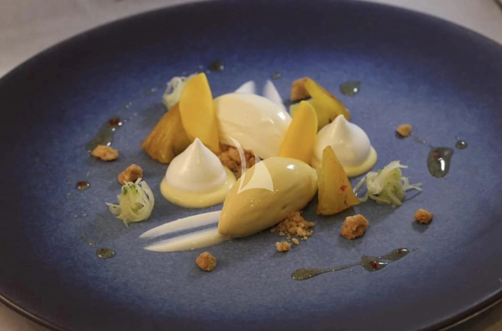 a pan full of food aboard LA DATCHA Yacht for Sale