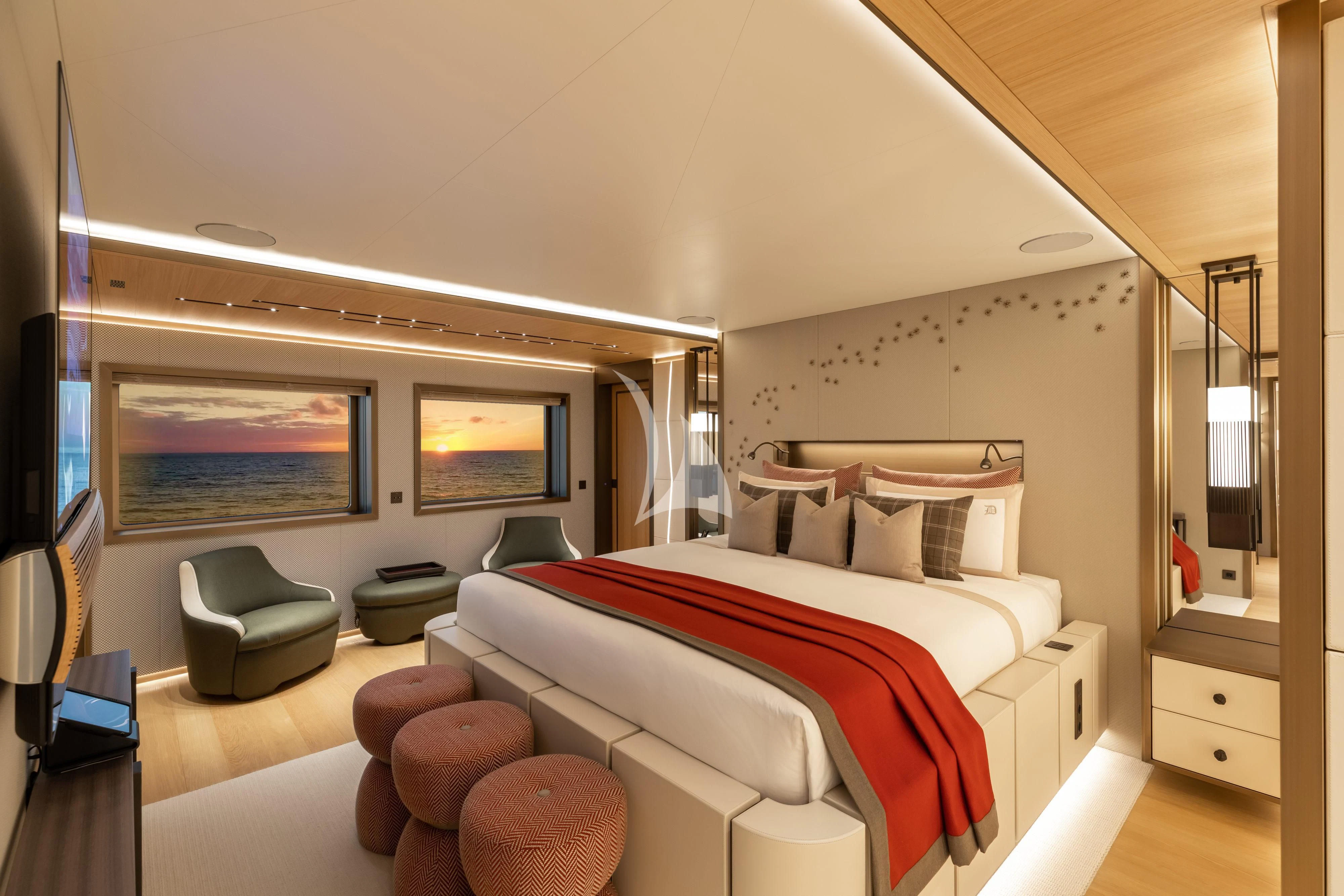 a bedroom with a bed and a tv aboard LA DATCHA Yacht for Sale