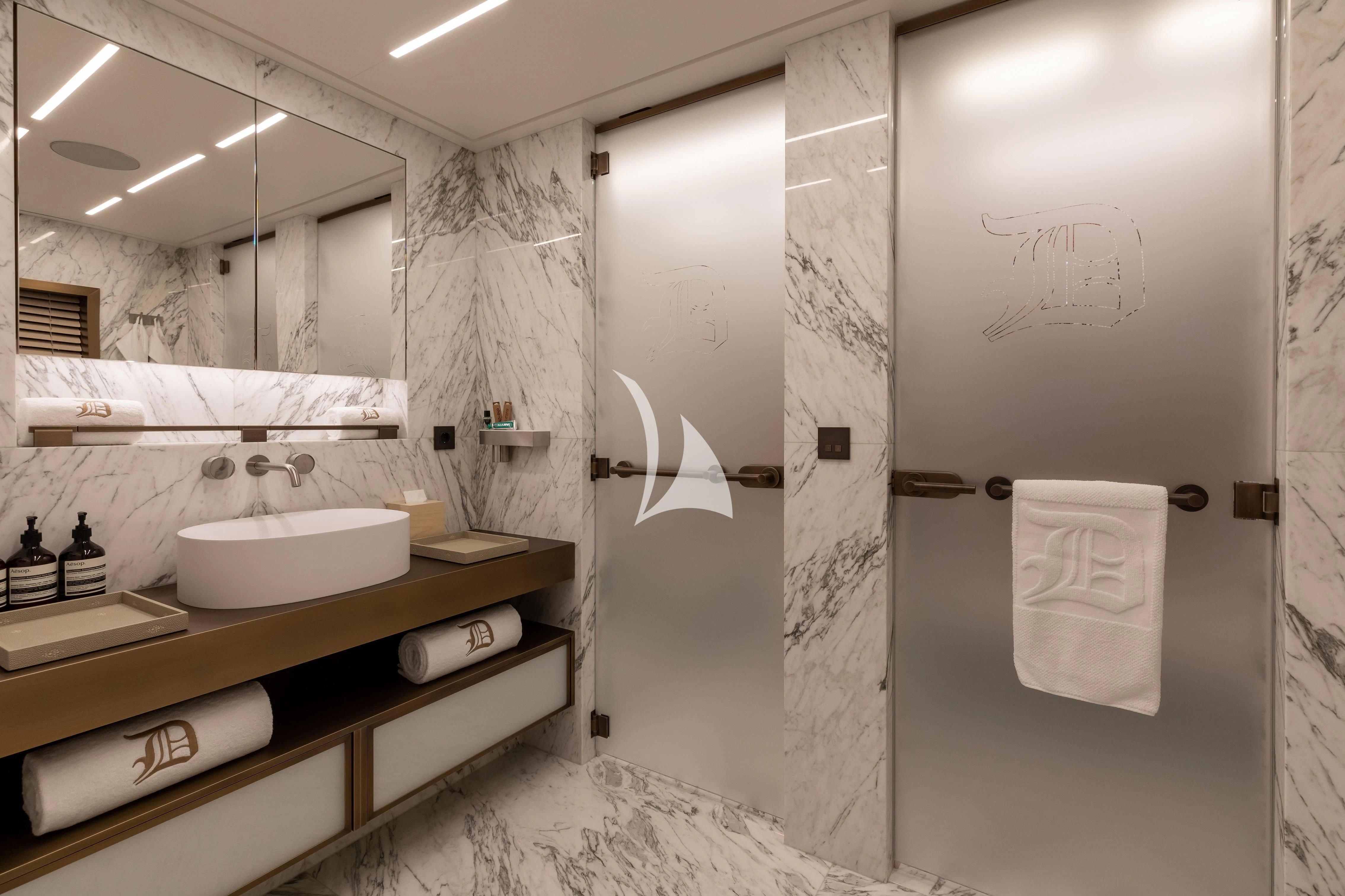 a bathroom with a sink and mirror aboard LA DATCHA Yacht for Sale