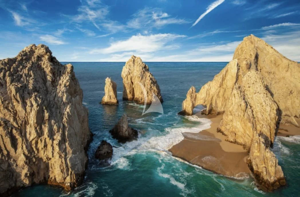 a body of water with large rocks aboard LA DATCHA Yacht for Sale