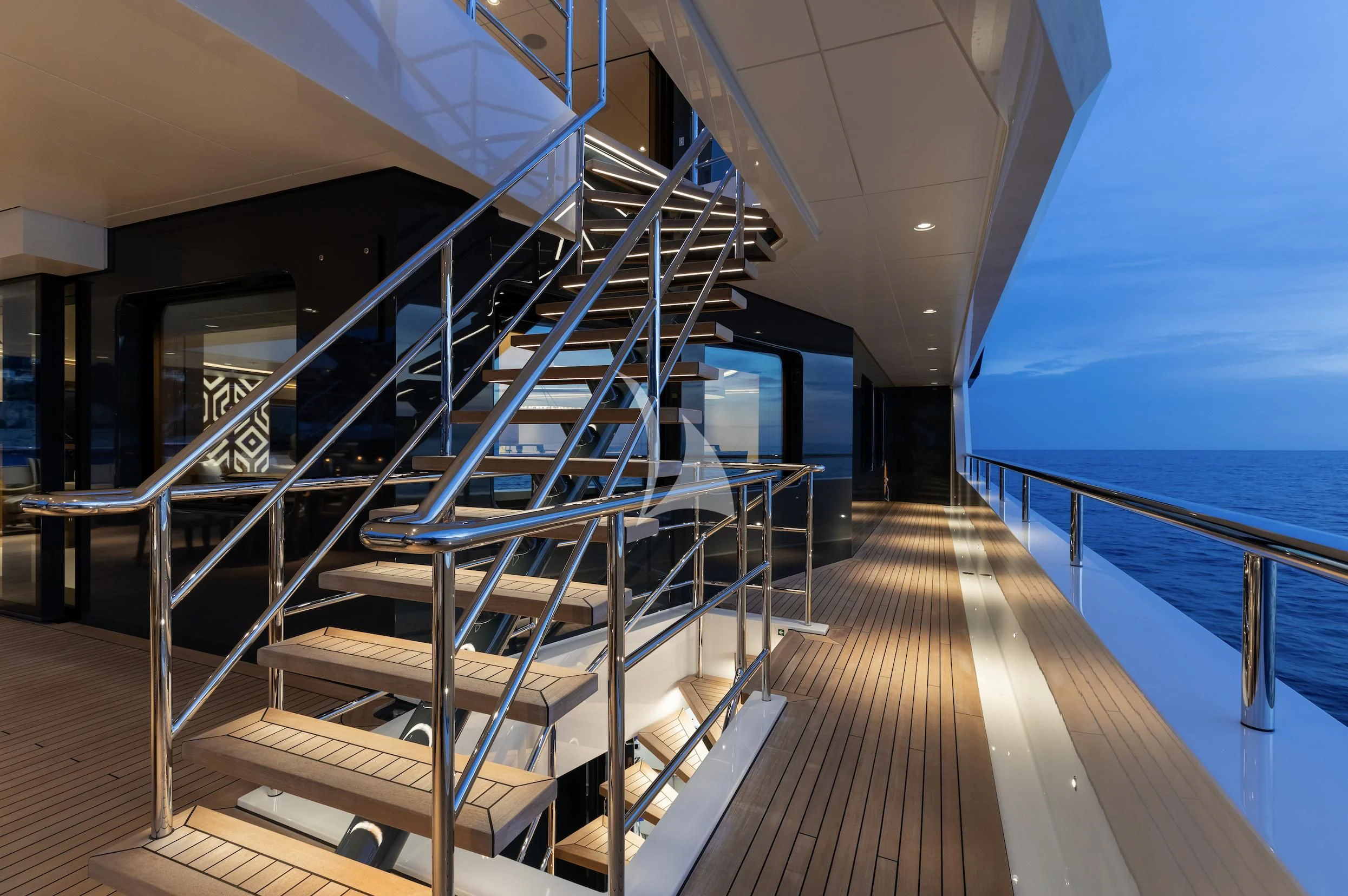 a wooden staircase leading to a balcony aboard LA DATCHA Yacht for Sale