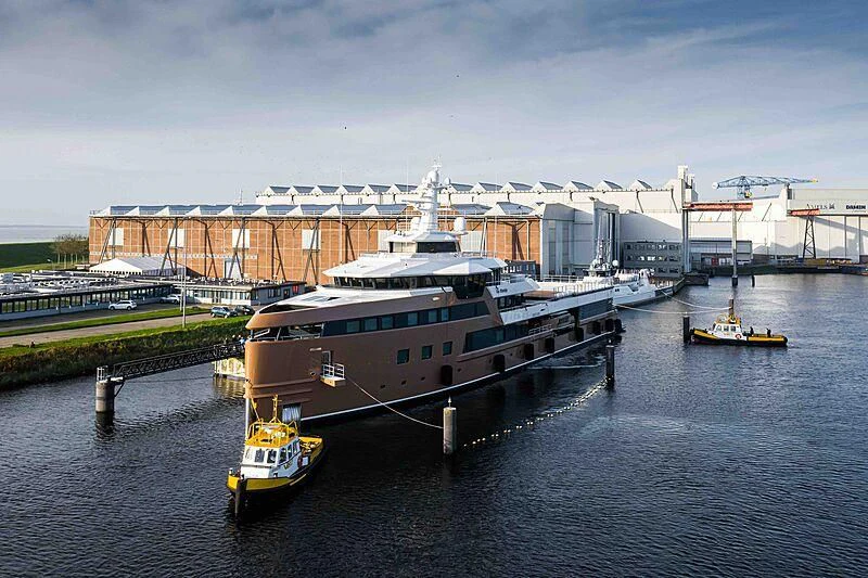 a large boat is parked in the water aboard LA DATCHA Yacht for Sale