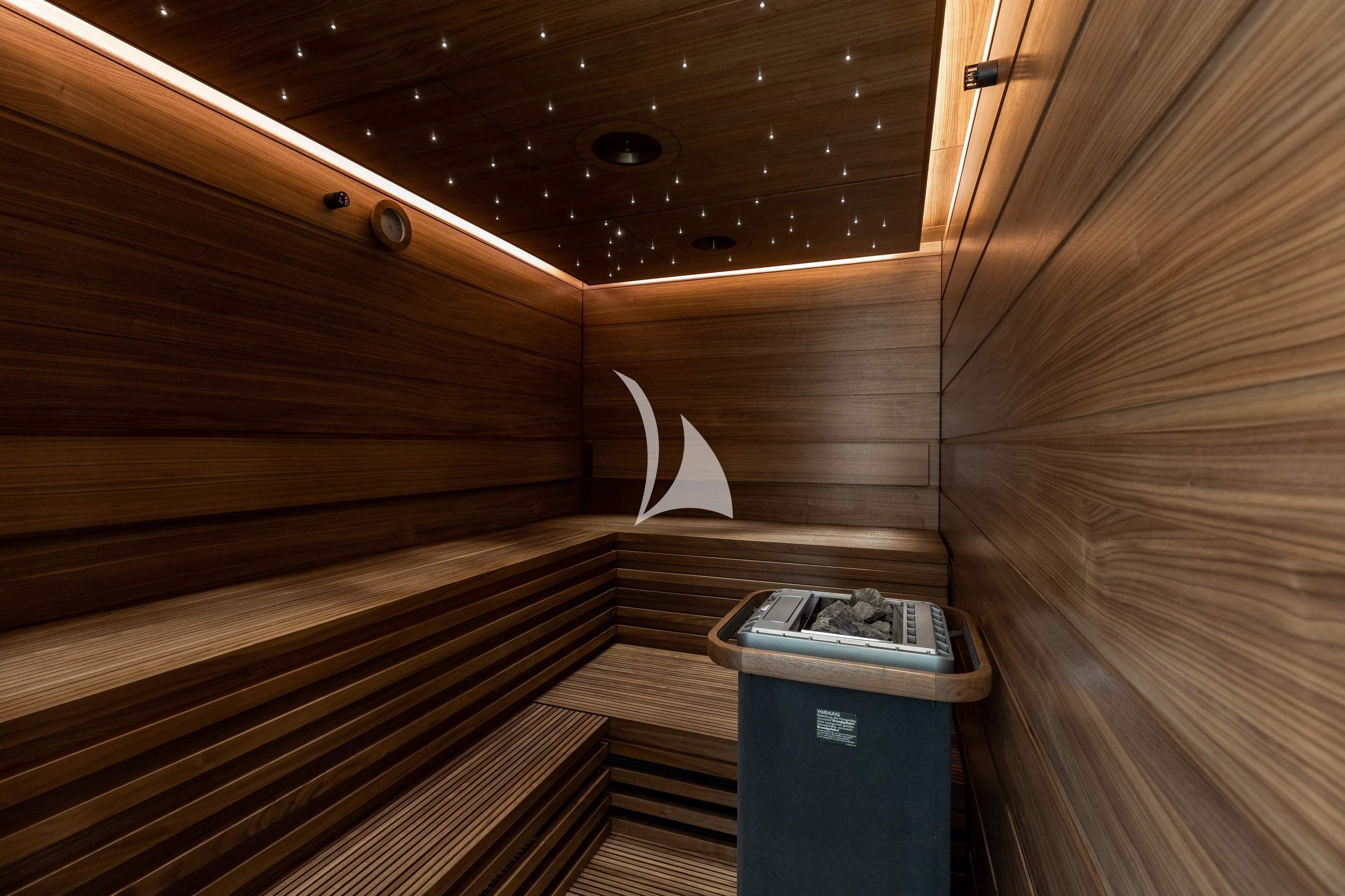 a wood cabin with a trash can and a trash can aboard LA DATCHA Yacht for Sale