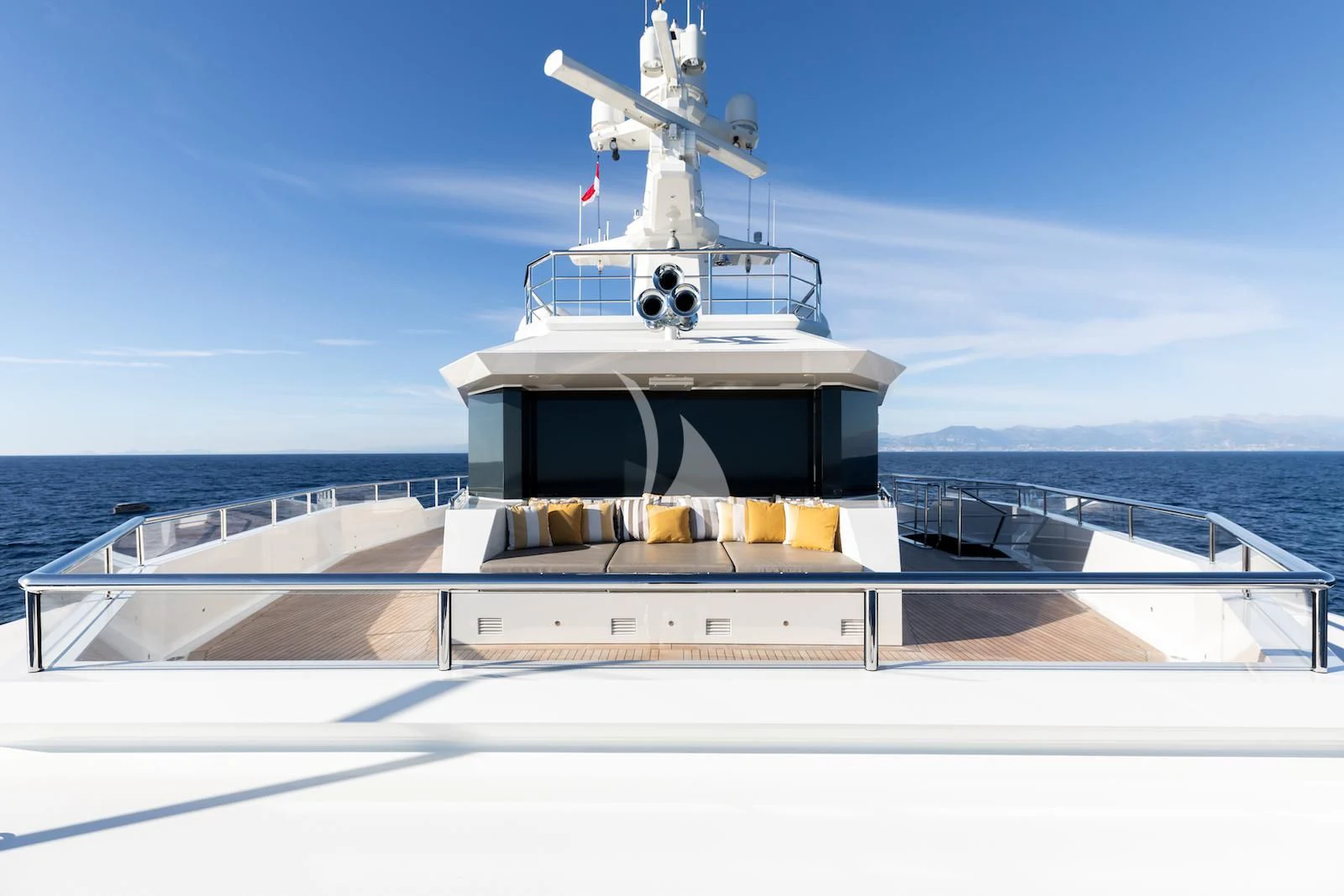 a white and black boat on a body of water aboard LA DATCHA Yacht for Sale