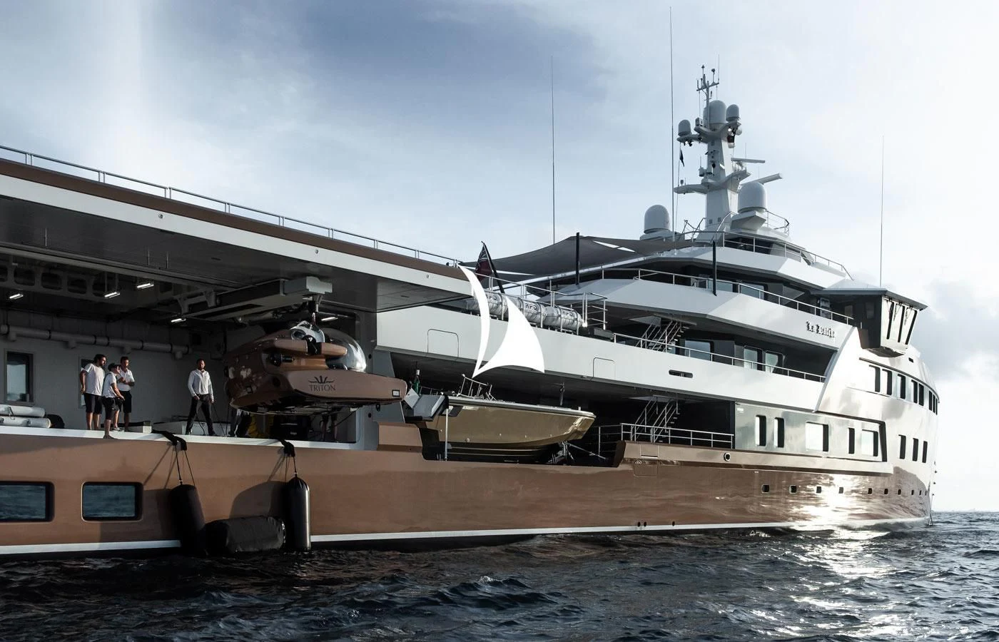 a large ship docked at a pier aboard LA DATCHA Yacht for Sale