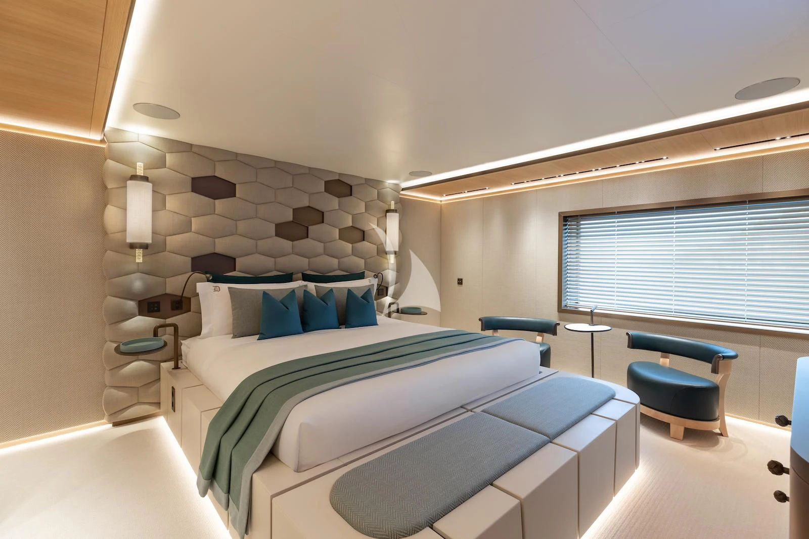 a room with a bed and a desk aboard LA DATCHA Yacht for Sale