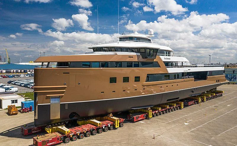 a large cruise ship docked aboard LA DATCHA Yacht for Sale