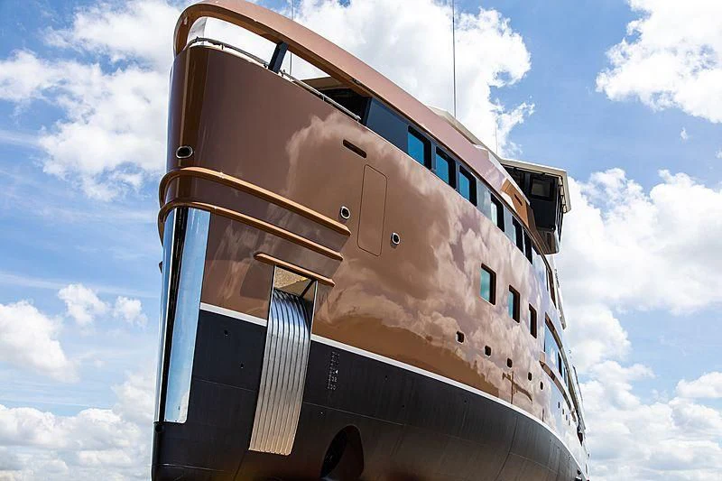 a large airplane in the sky aboard LA DATCHA Yacht for Sale